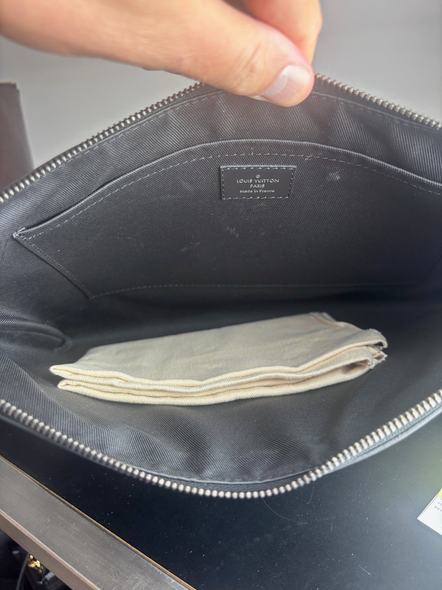 Louis Vuitton Pochette Voyage in Monogram Eclipse canvas