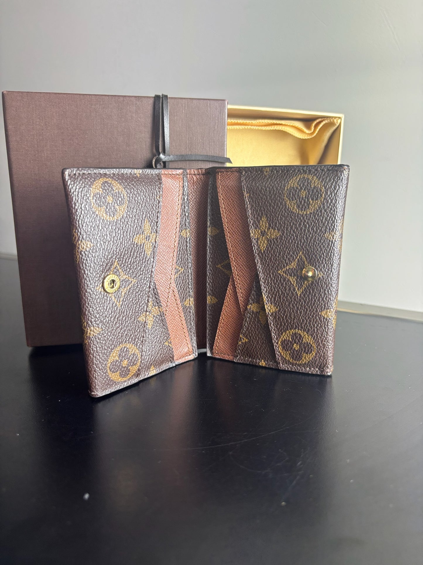 Louis Vuitton Victorine Wallet in classic monogram canvas