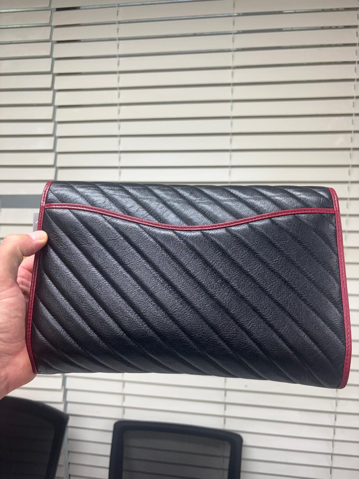 Gucci GG Marmont chevron matelassé leather clutch