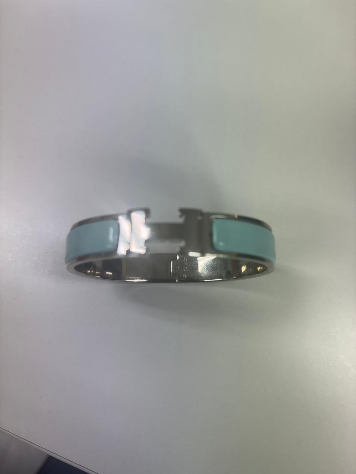 Hermès Clic H bracelet in light blue enamel and palladium-plated hardware