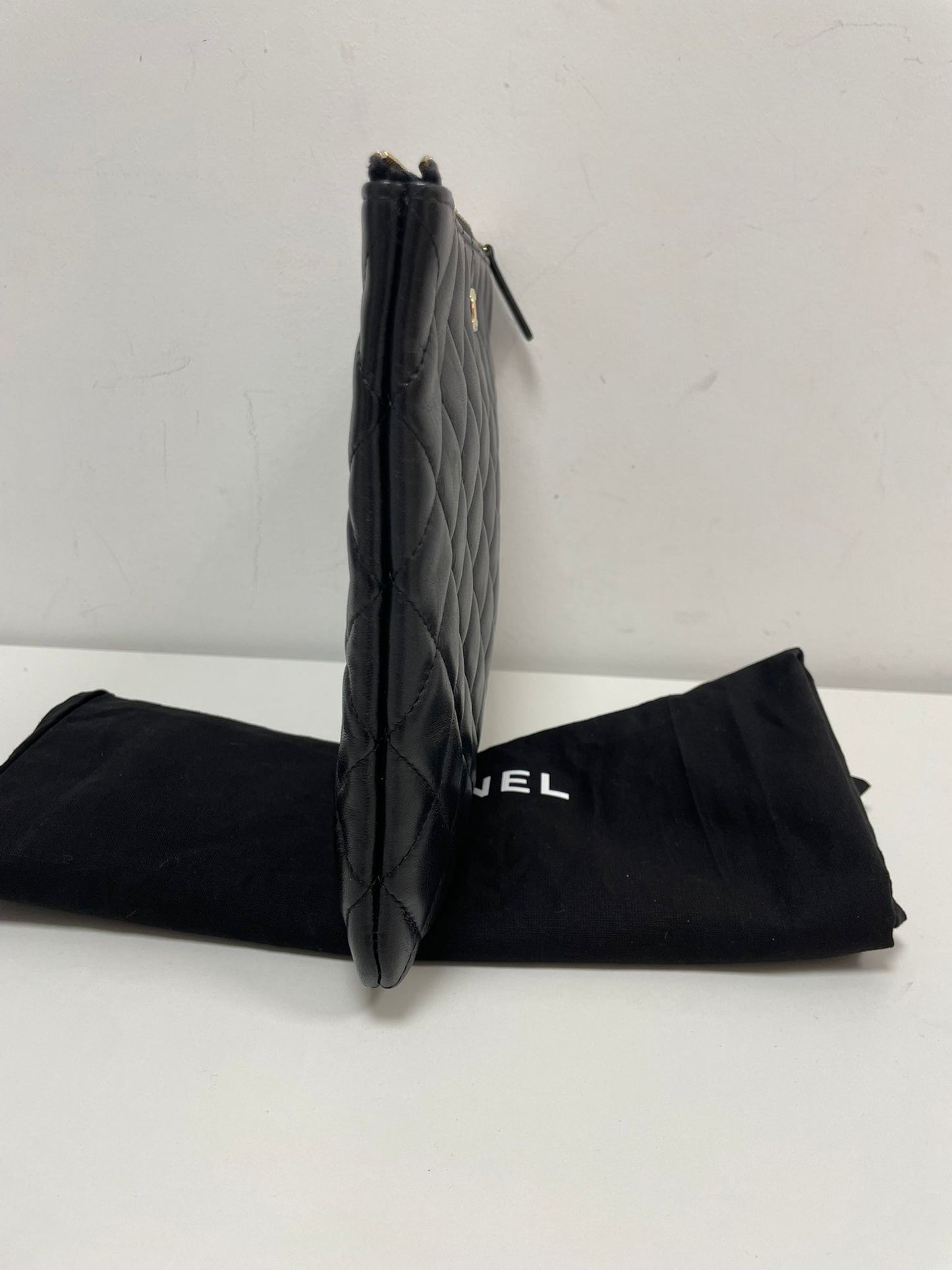 Chanel Large O-Case Quilted Leather Clutch in Black