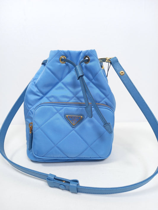 M0804P11 Prada Tessuto Nylon Pervinca Blue Duet Drawstring Quilted Bucket Bag (JP)
