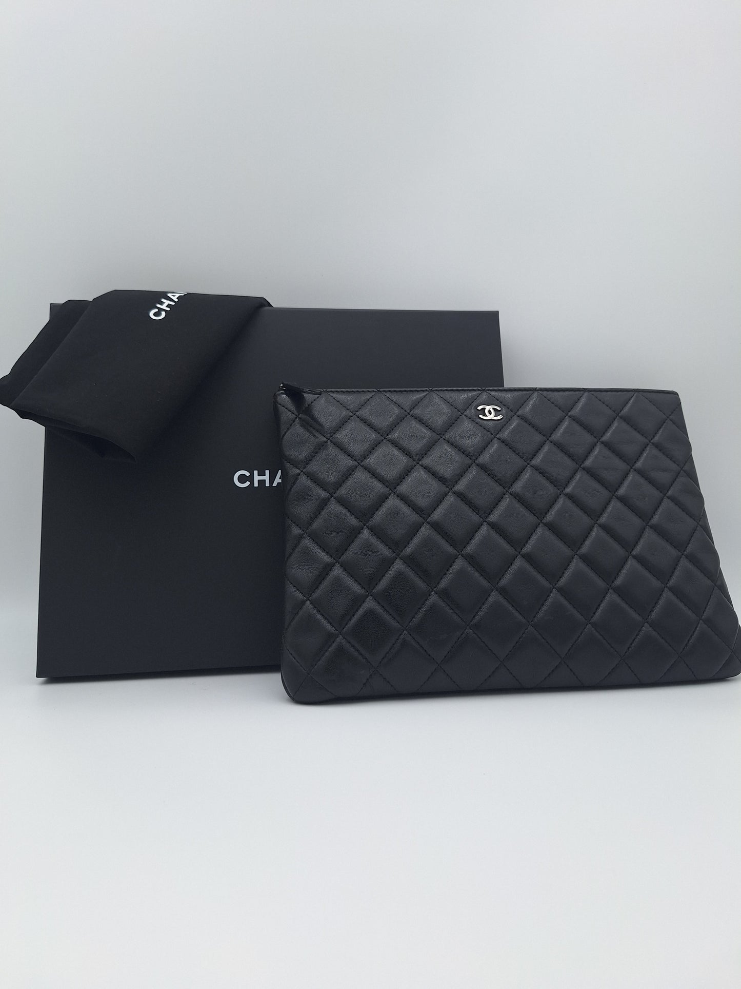 Chanel Quilted Caviar Leather Large O-case Clutch (US)