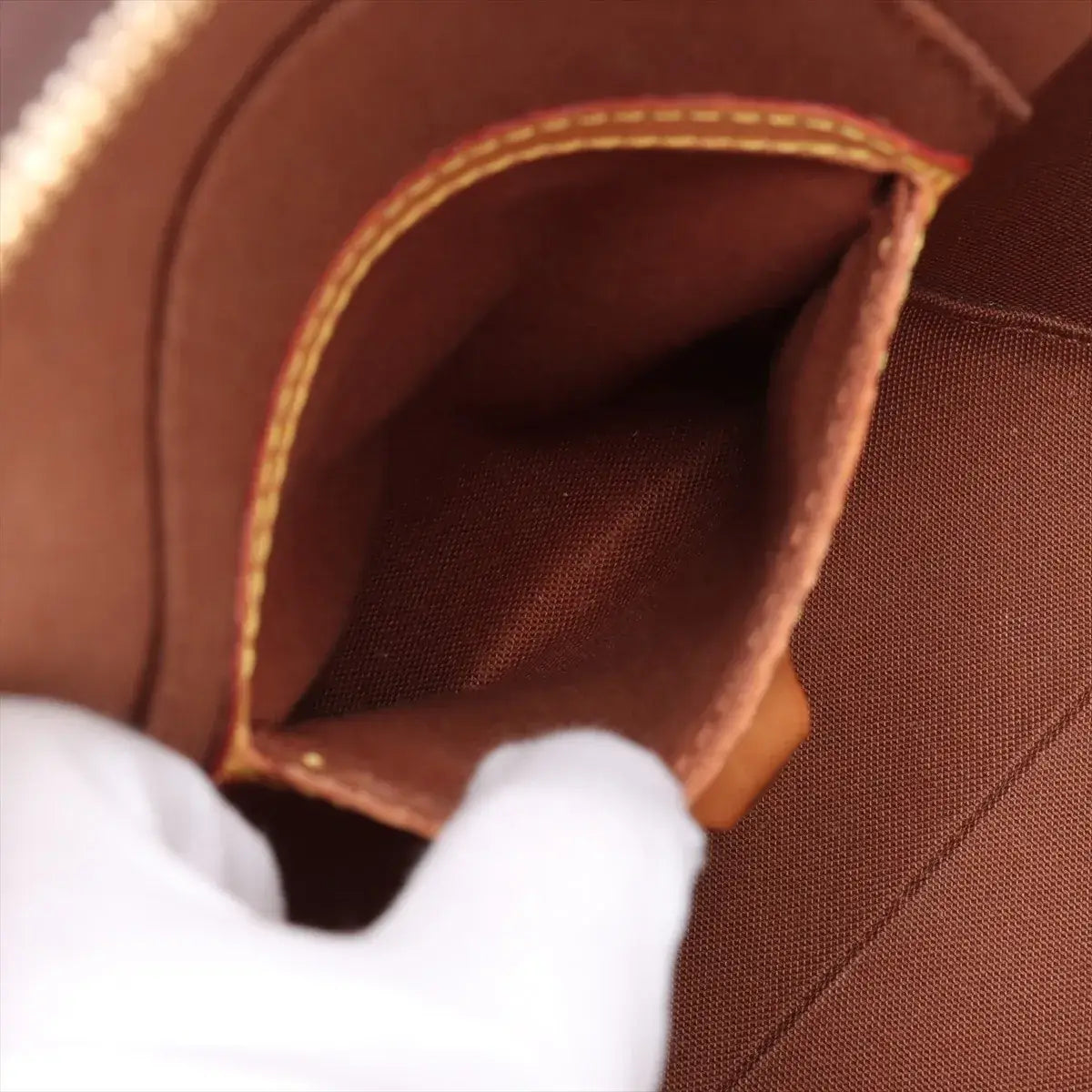 Interior of Louis Vuitton Monogram Ellipse PM Brown M51127 SD1929 (Pre-Owned) showing pocket detail.