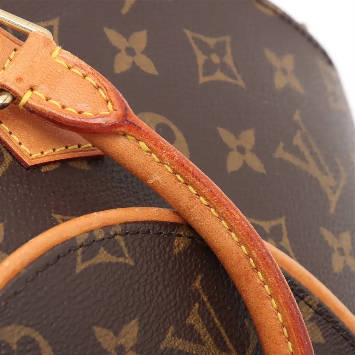 Louis Vuitton Monogram Ellipse PM Brown M51127 SD1929 (Pre-Owned) close-up of leather strap and monogram canvas.