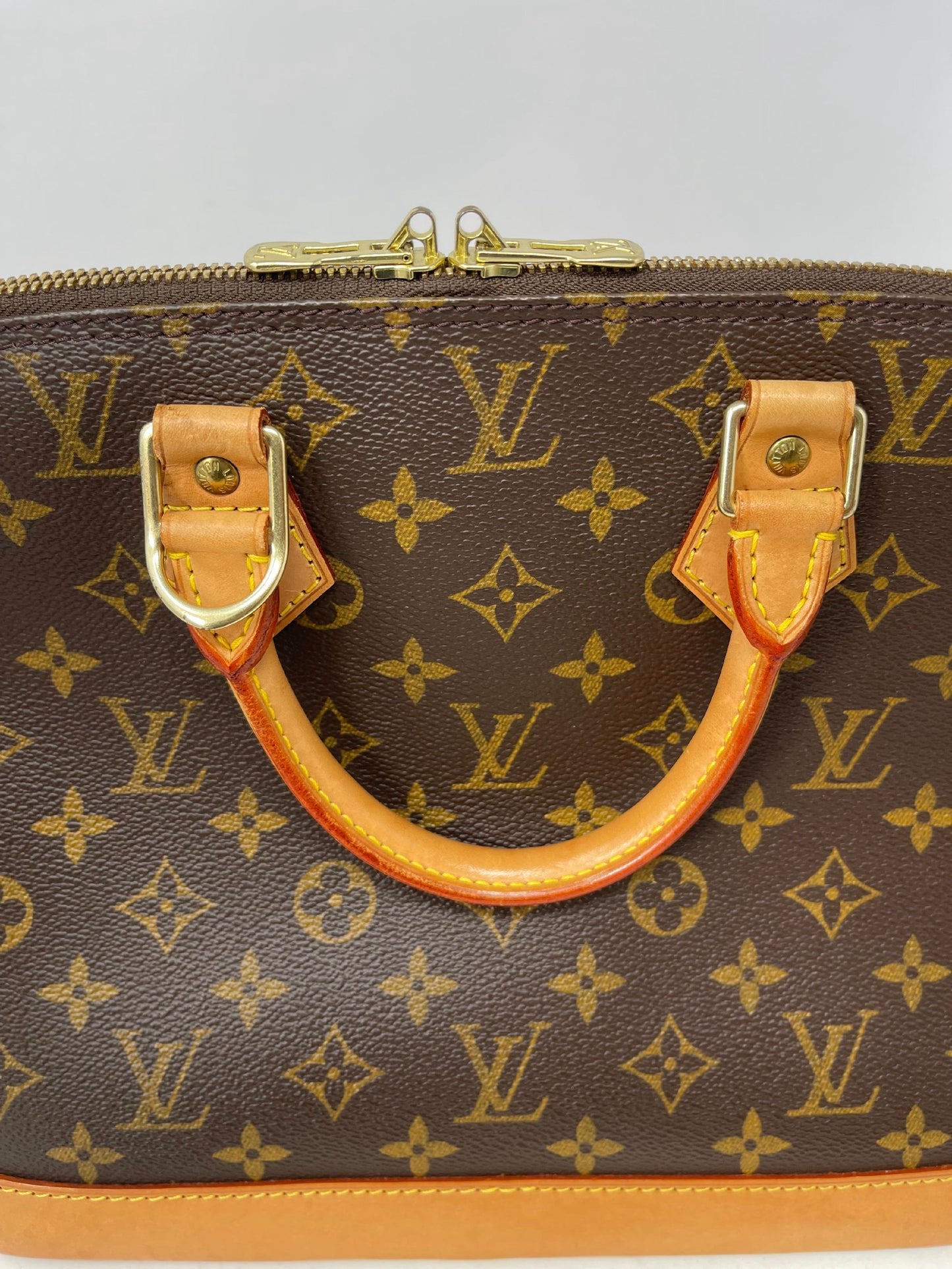 Louis Vuitton Alma Monogram Bag