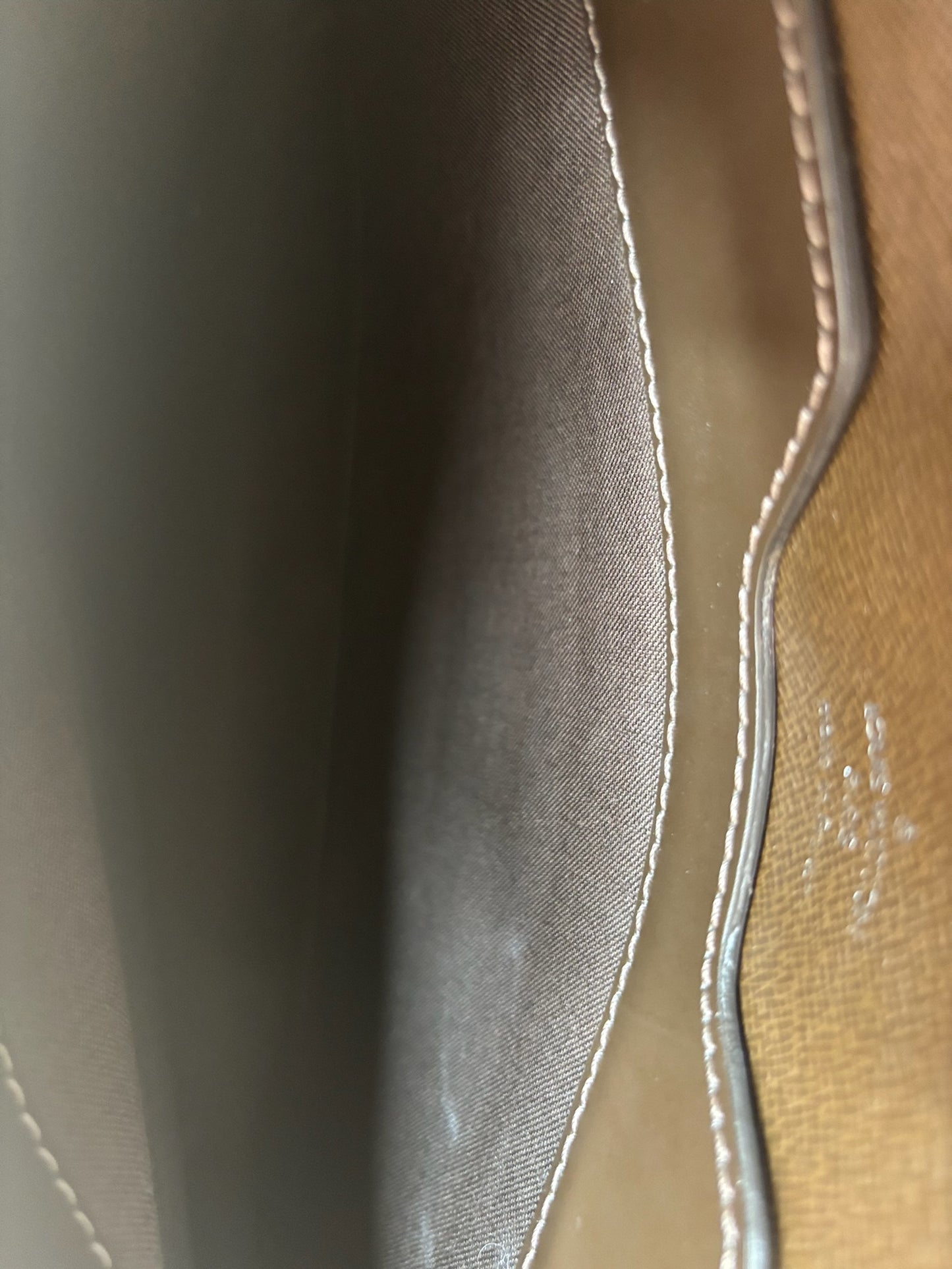 Louis Vuitton Taiga Leather Minuto Portfolio in Brown