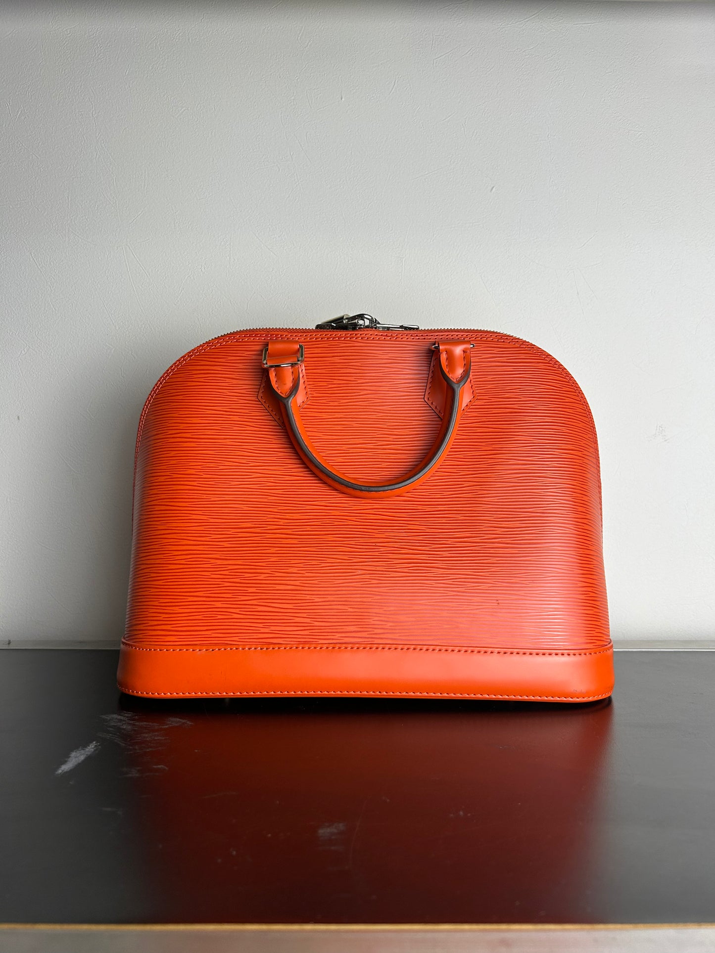 Louis Vuitton Alma PM in Epi leather handbag