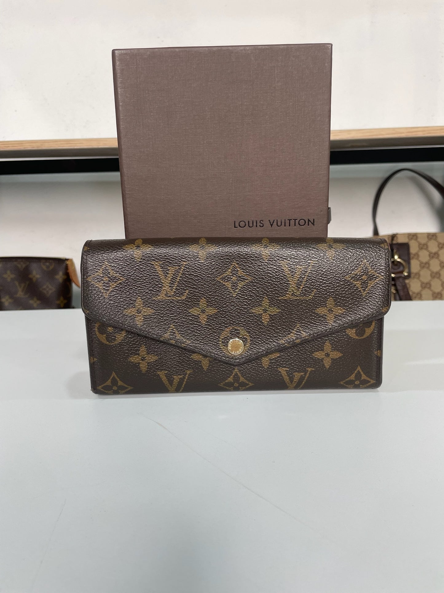 M0707-90 Louis Vuitton Sarah Wallet