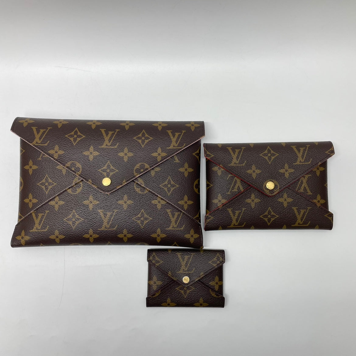 Louis Vuitton PVC Monogram Canvas Pochette Kirigami ONE Clutch M62034