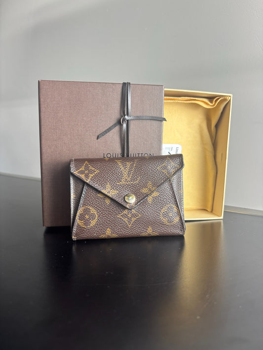 Louis Vuitton Victorine Wallet in classic monogram canvas