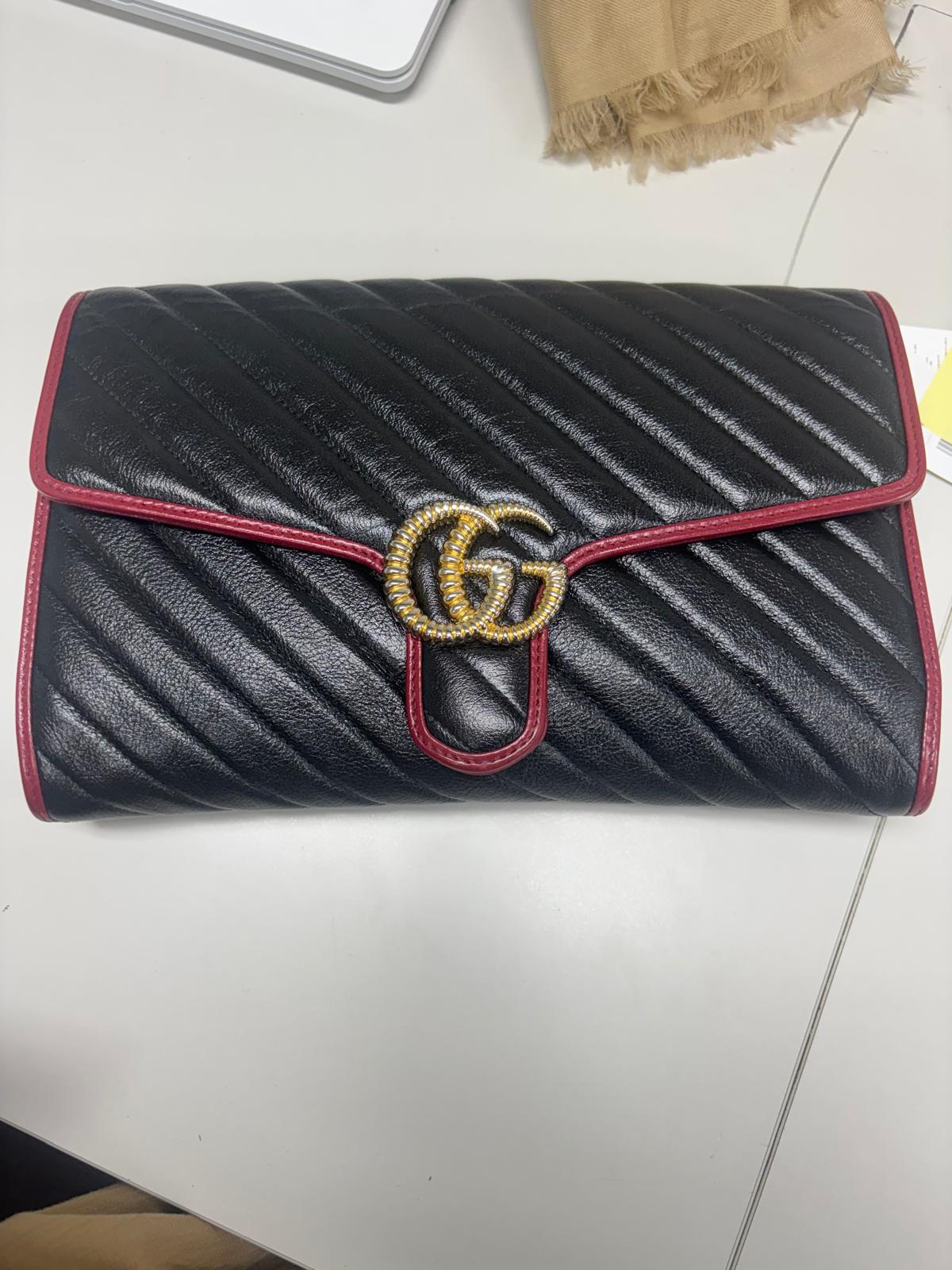 Gucci GG Marmont chevron matelassé leather clutch