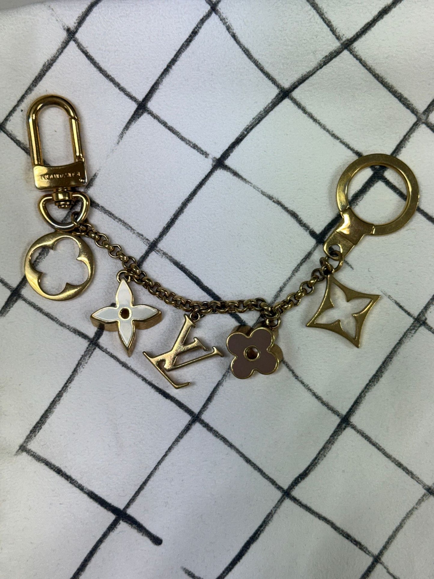 Louis Vuitton Fleur de Monogram bag charm in gold metal