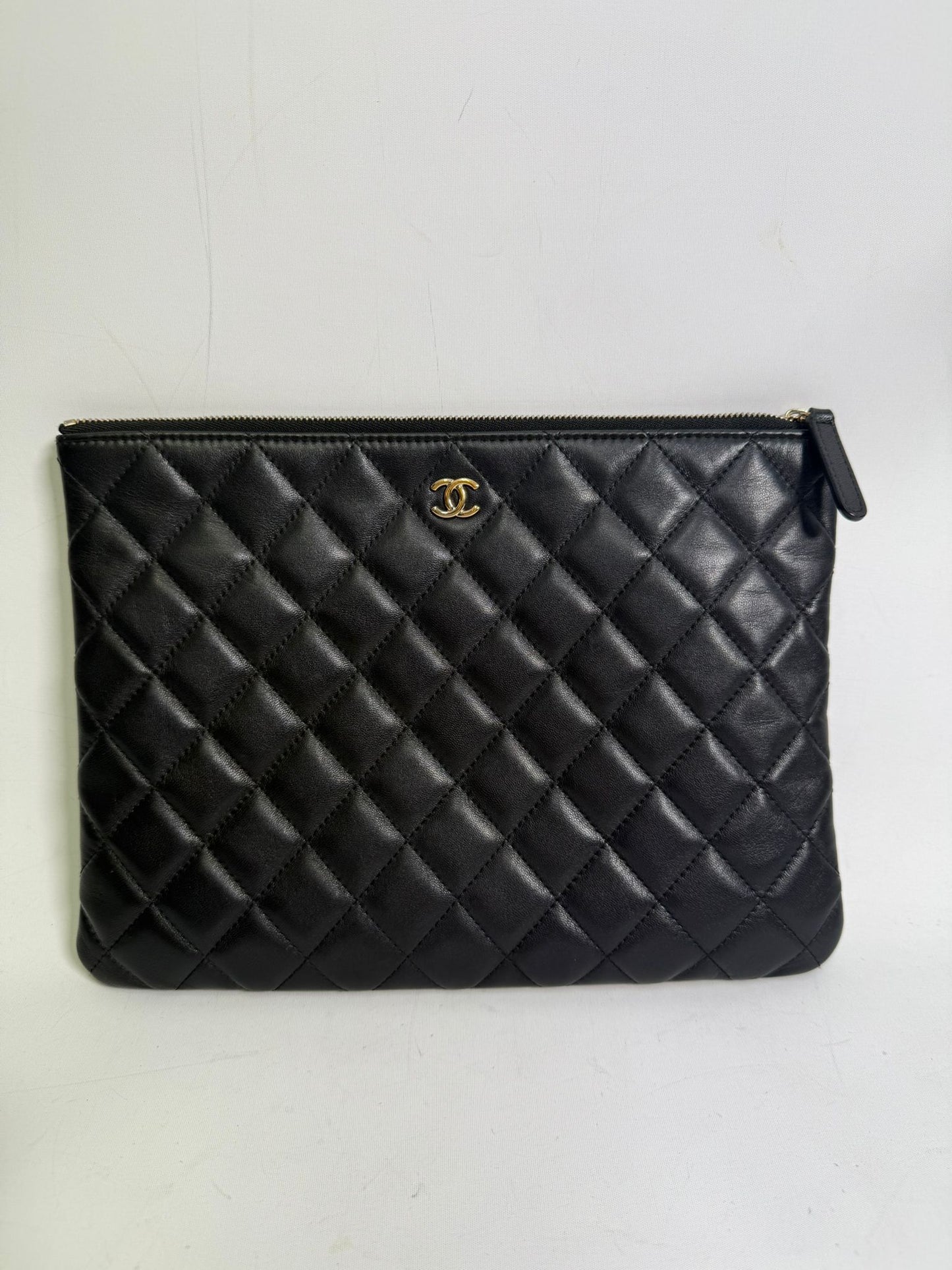 Chanel Quilted Caviar O Case Clutch