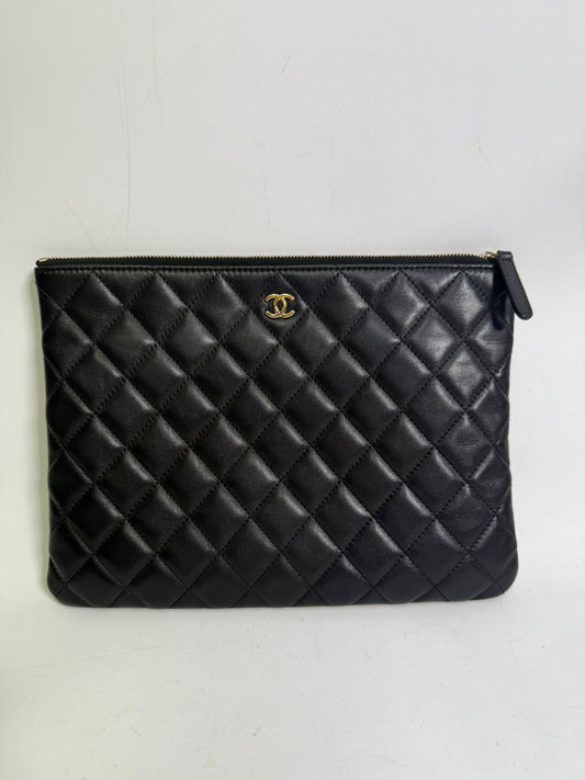 Chanel Quilted Caviar O Case Clutch