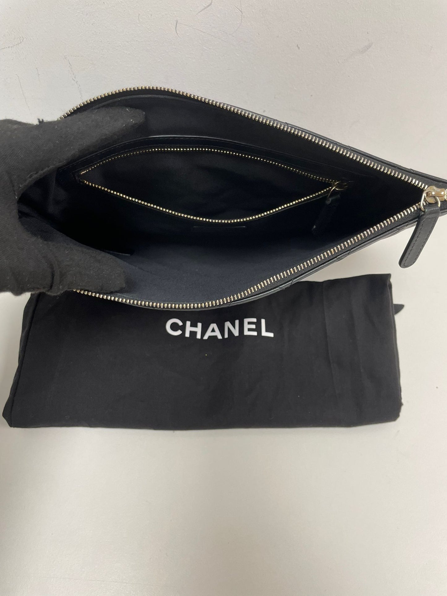 Chanel Large O-Case Quilted Leather Clutch in Black