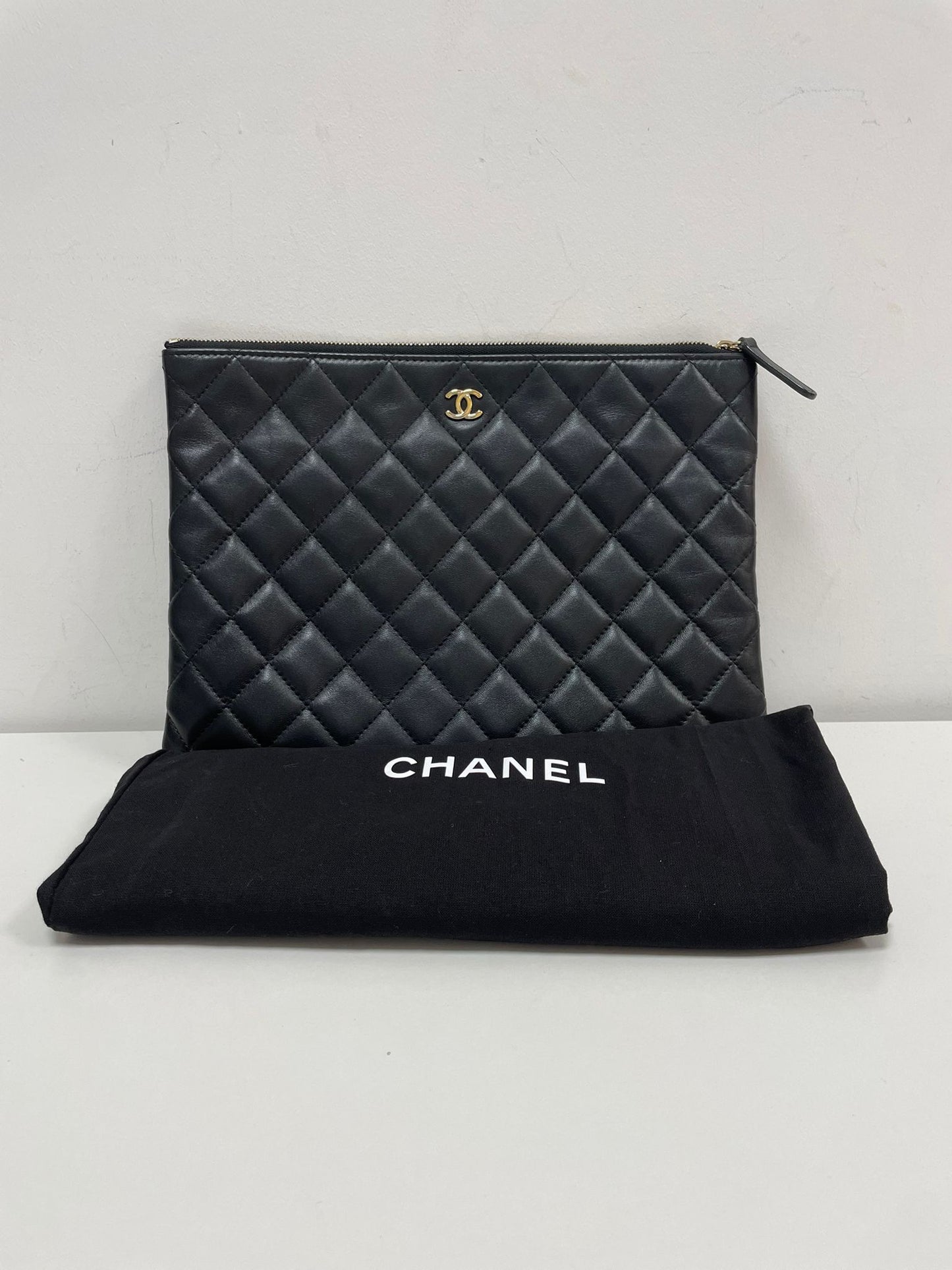 Chanel Large O-Case Quilted Leather Clutch in Black