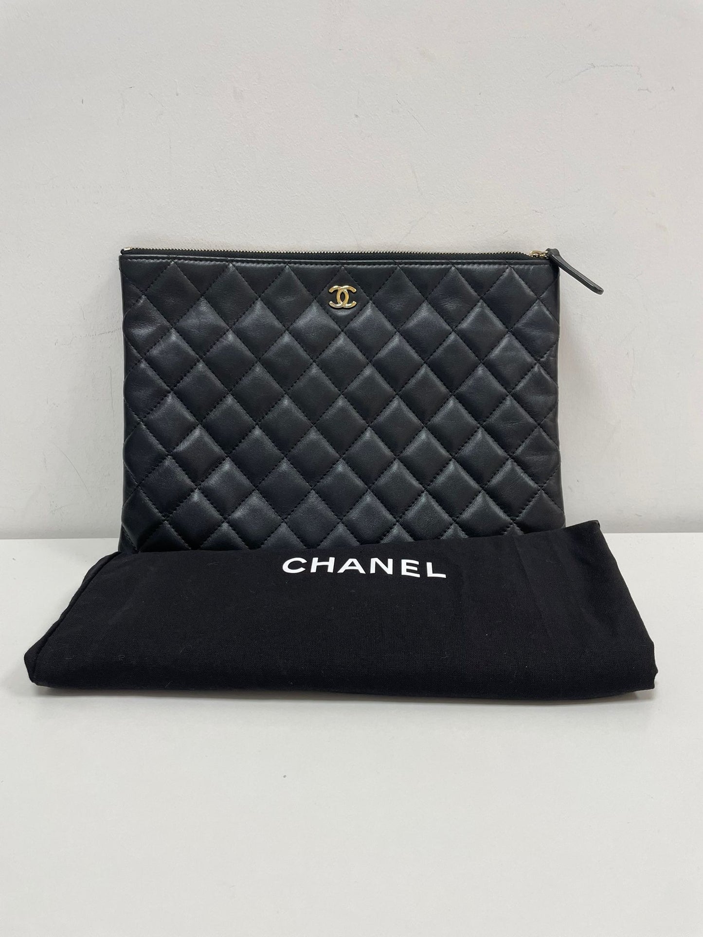 Chanel Large O-Case Quilted Leather Clutch in Black